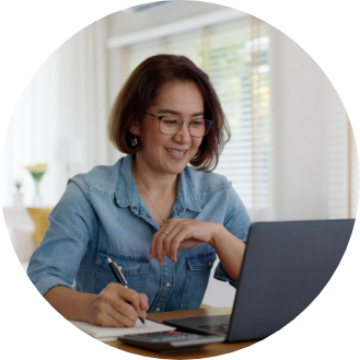 Woman working on her computer at home.