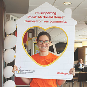 Payworks employee at a RMHC - Pay It Forward activity. Payworks employee at a McHappy Day community activity.