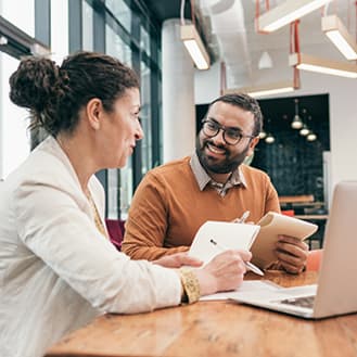 Two people having a business meeting.